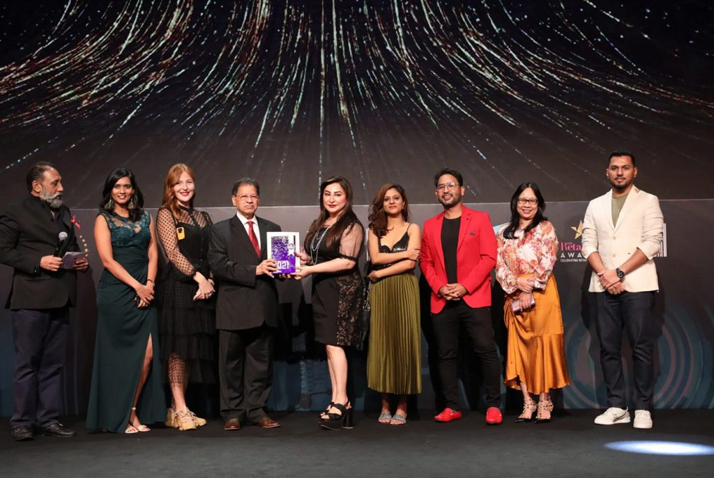 Group of people receiving an award