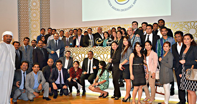 Group of people receiving an award