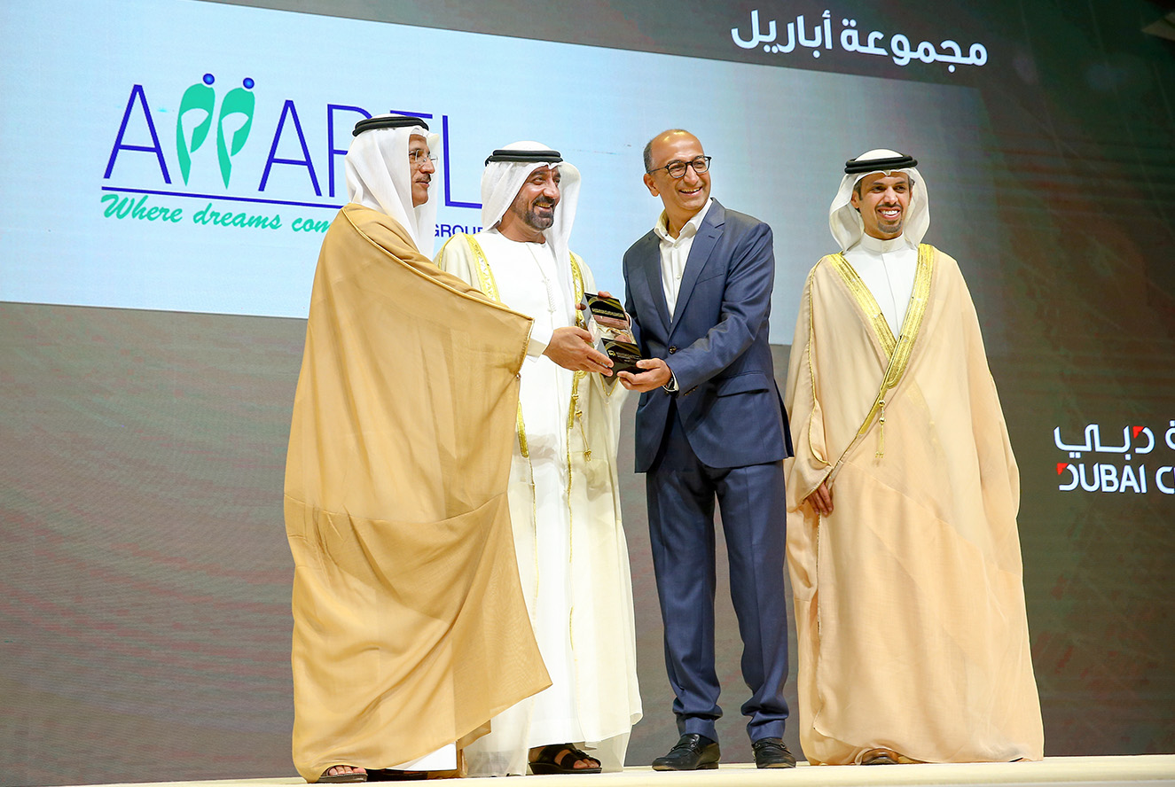 Four Men Carrying an Award