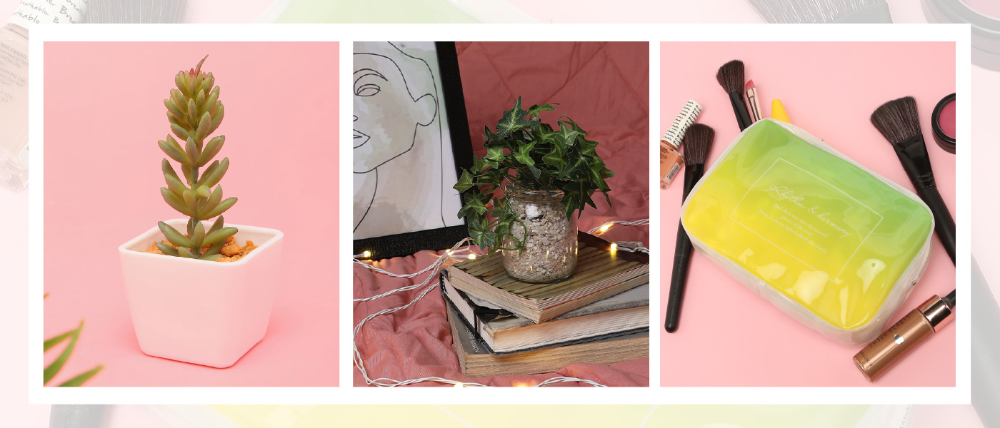 A small plant in a jar on top of books between a small plant in white pot and make-up kit on the other side