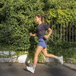 Woman running in F5 clothing | Apparel Group