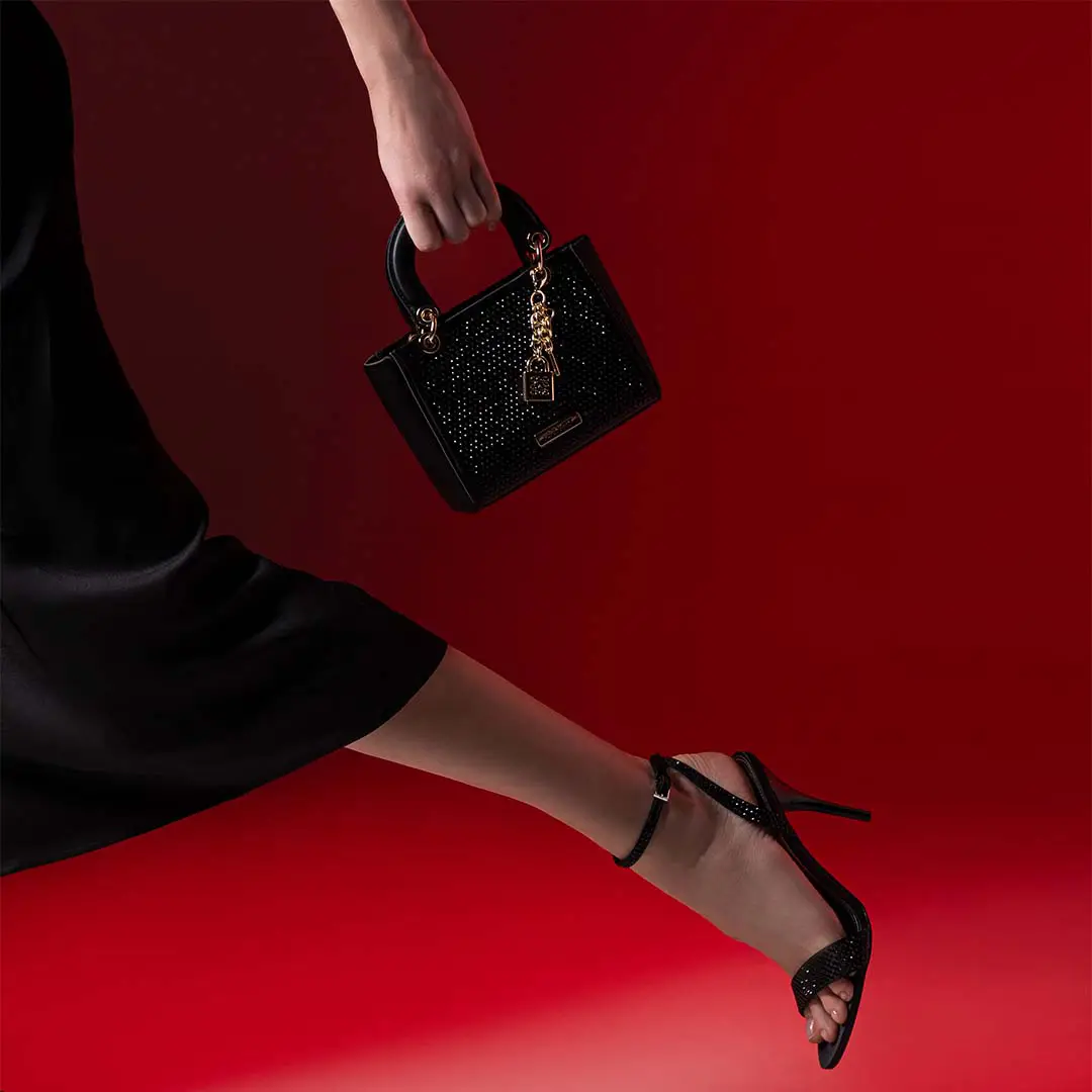 Black heels and a coordinating bag from Nine West embellished with shimmering diamonds