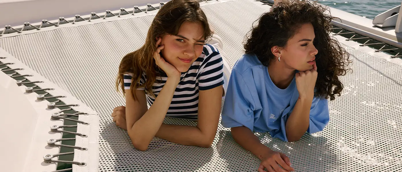 Two girls wearing Ardene clothes