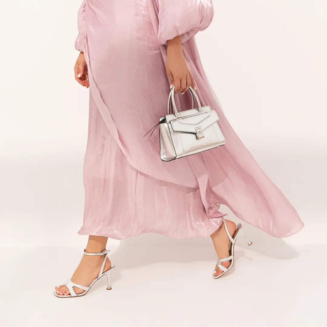 Nine West's Silver handbag and heels: a polished choice for festive occasions