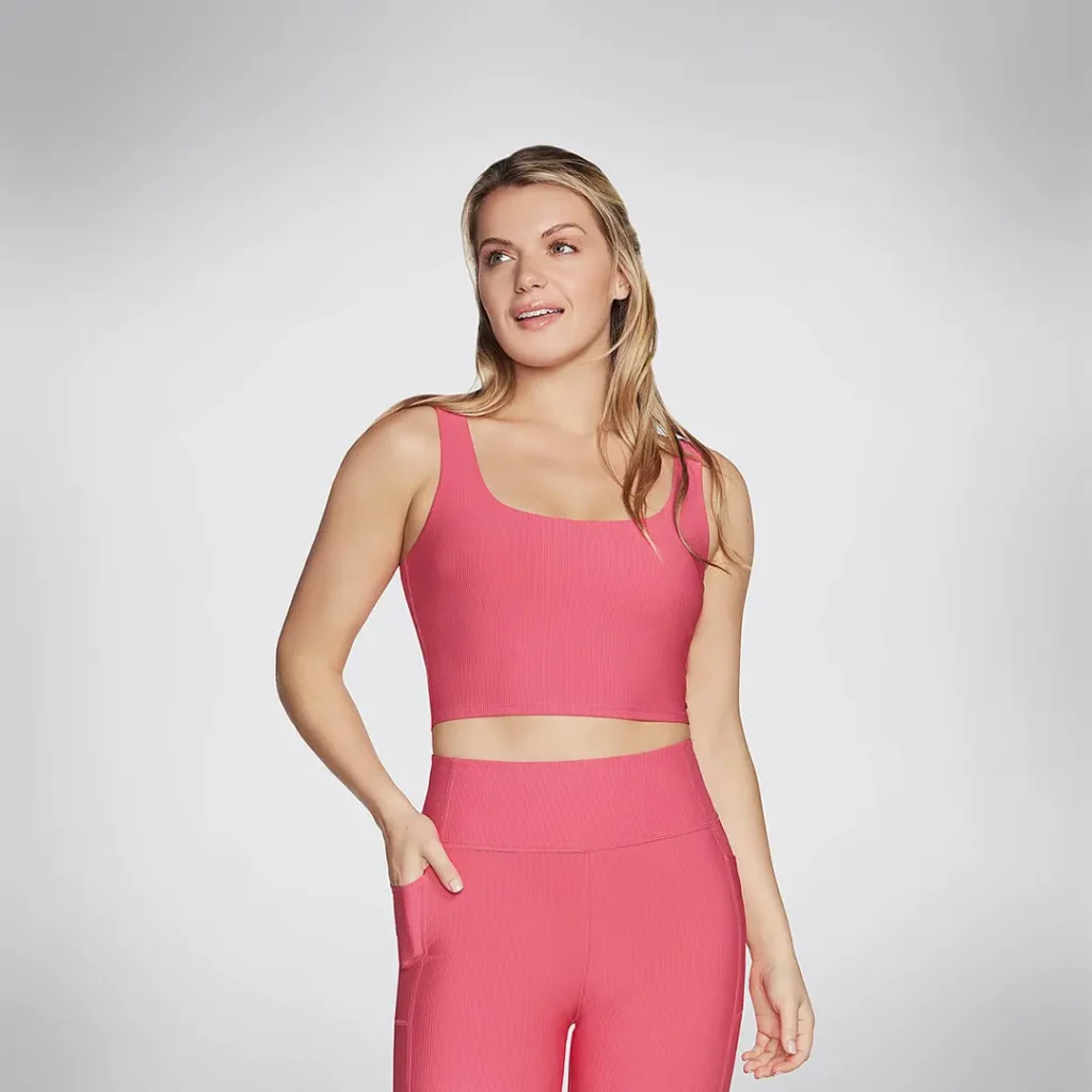 Skechers sports bra and leggings are set in pink, ideal for an active lifestyle