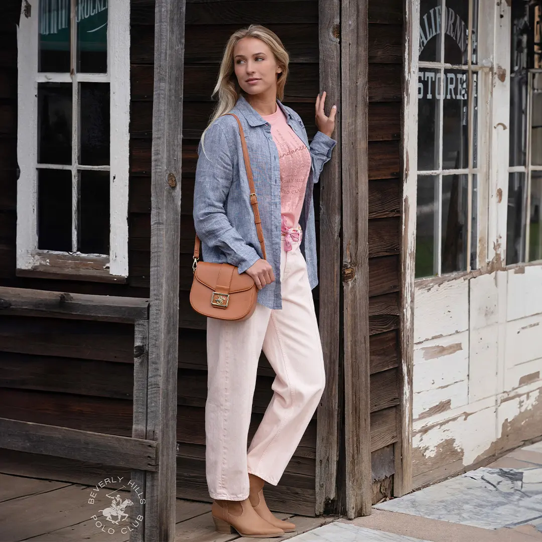 Woman in Blue Button-Up from Beverly Hills Polo Club