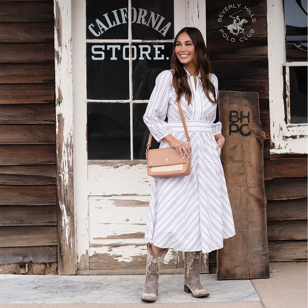 Woman in a White Striped Dress from Beverly Hills Polo Club